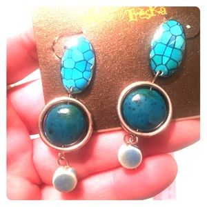 Turquoise colored earrings